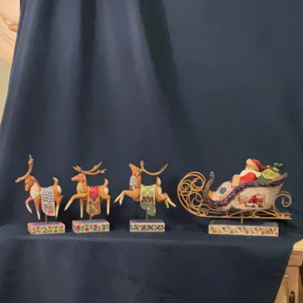 Jim Shore “Delivering Joy” Full Set with sleigh, blue, green and red reindeer.